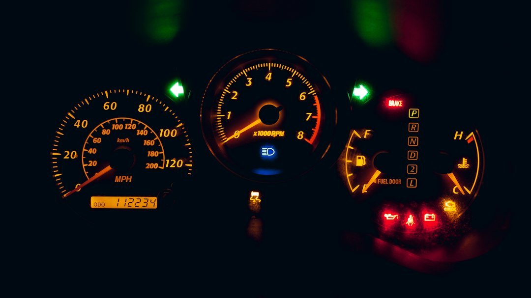 Car dashboard odometer used to track mileage for delivery drivers